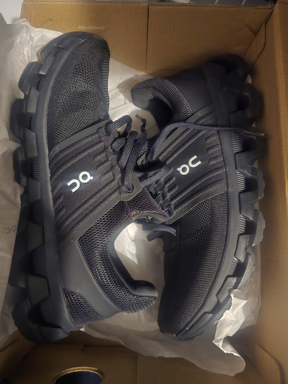 On Running Men's Black Athletic Trail Shoes with White Logo Accent